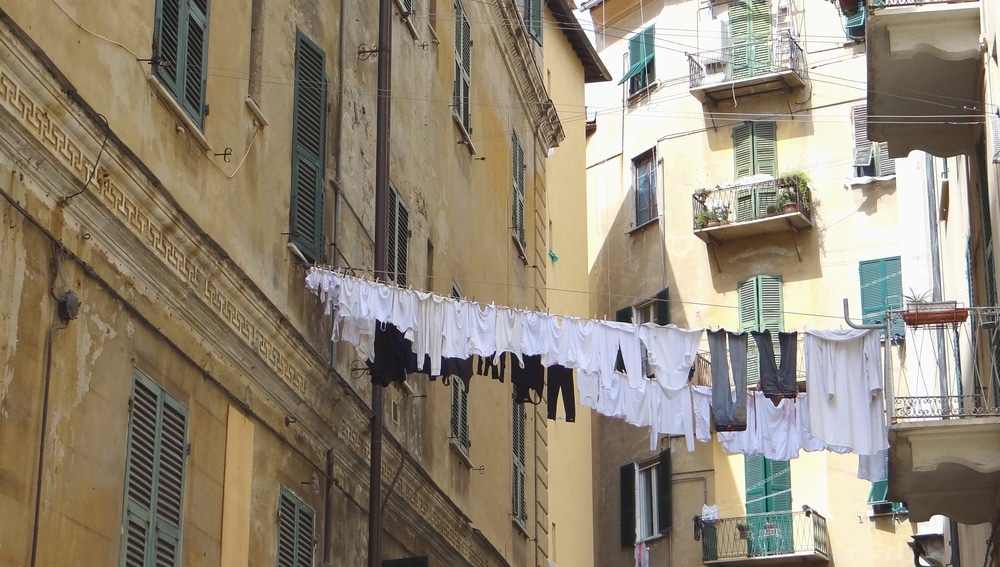 clothes on clothing line across buildings