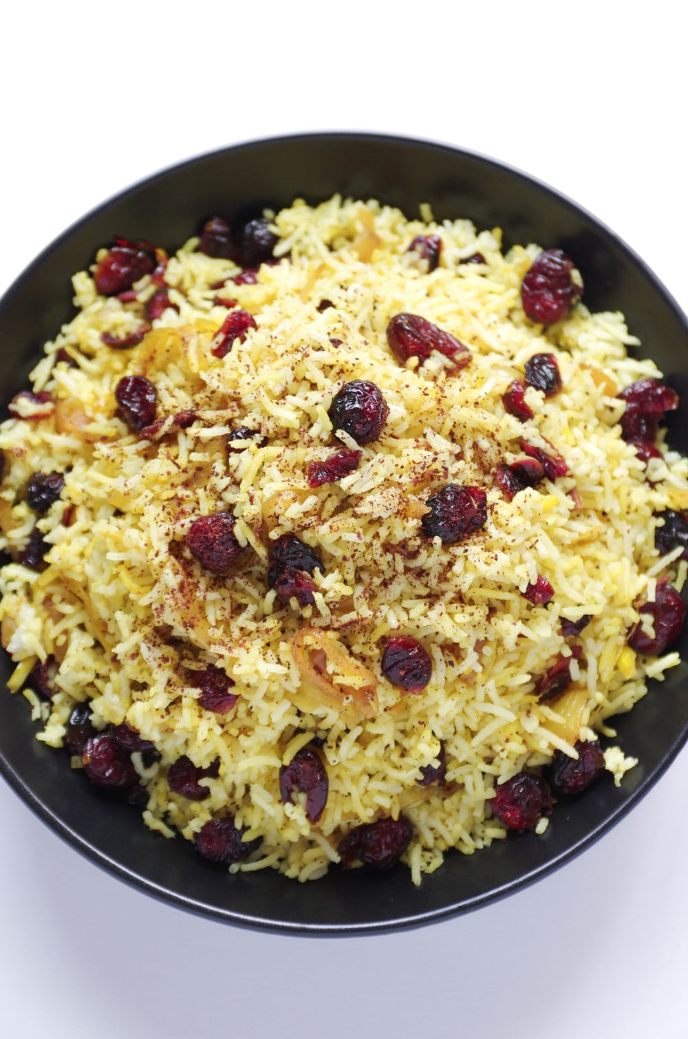 plate of Persian Cranberry Rice Pilaf sprinkled with sumac 