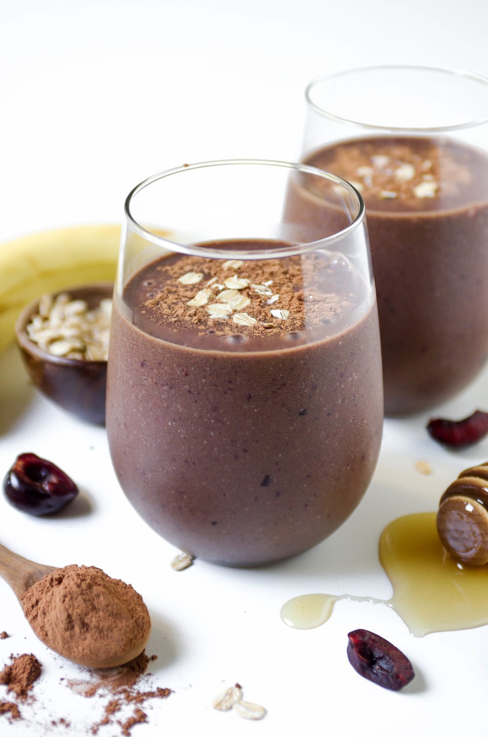 two glasses filled with Chocolate Cherry Smoothie