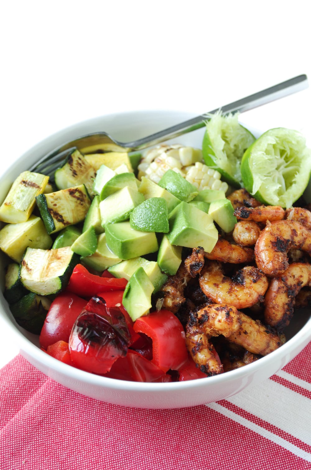 close up of Grilled Shrimp and Veggies in white Bowls