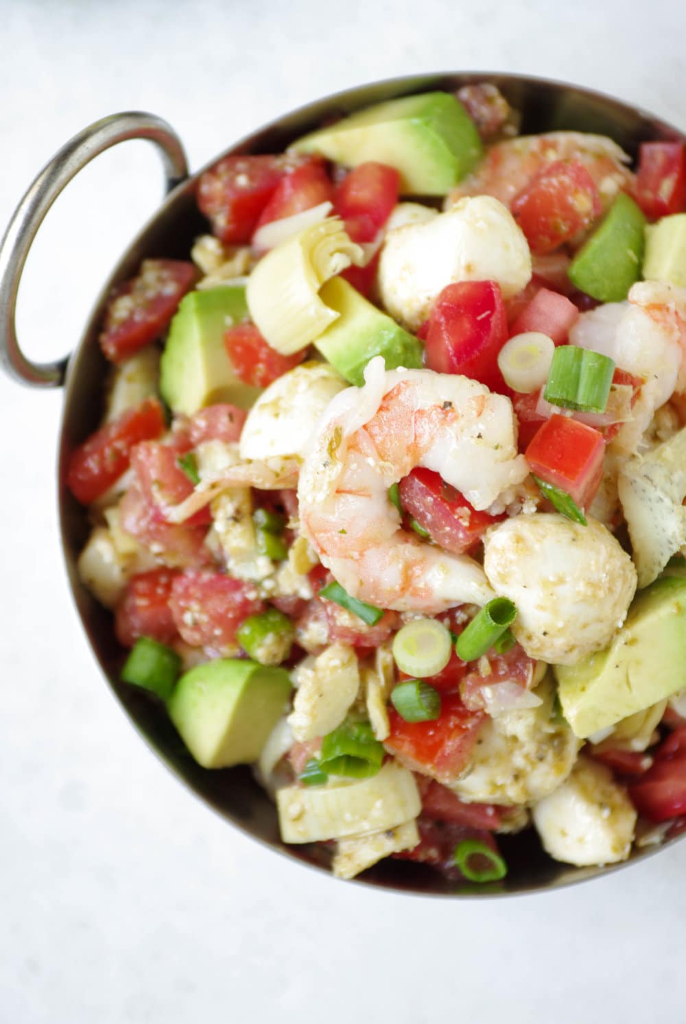 close up of bowl filled with Shrimp Bruschetta