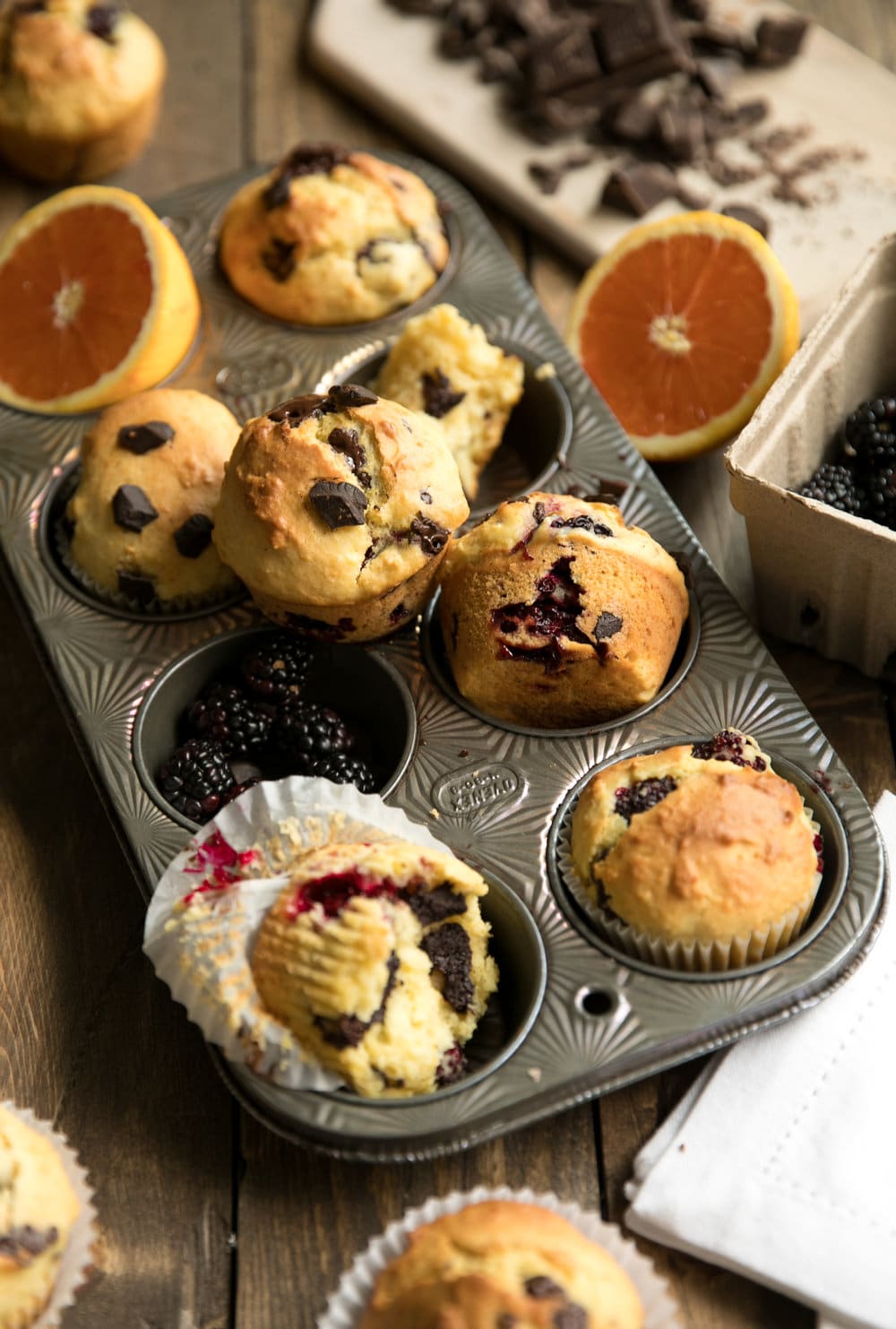 Blackberry and Orange Muffins with Dark Chocolate Chunks in pan