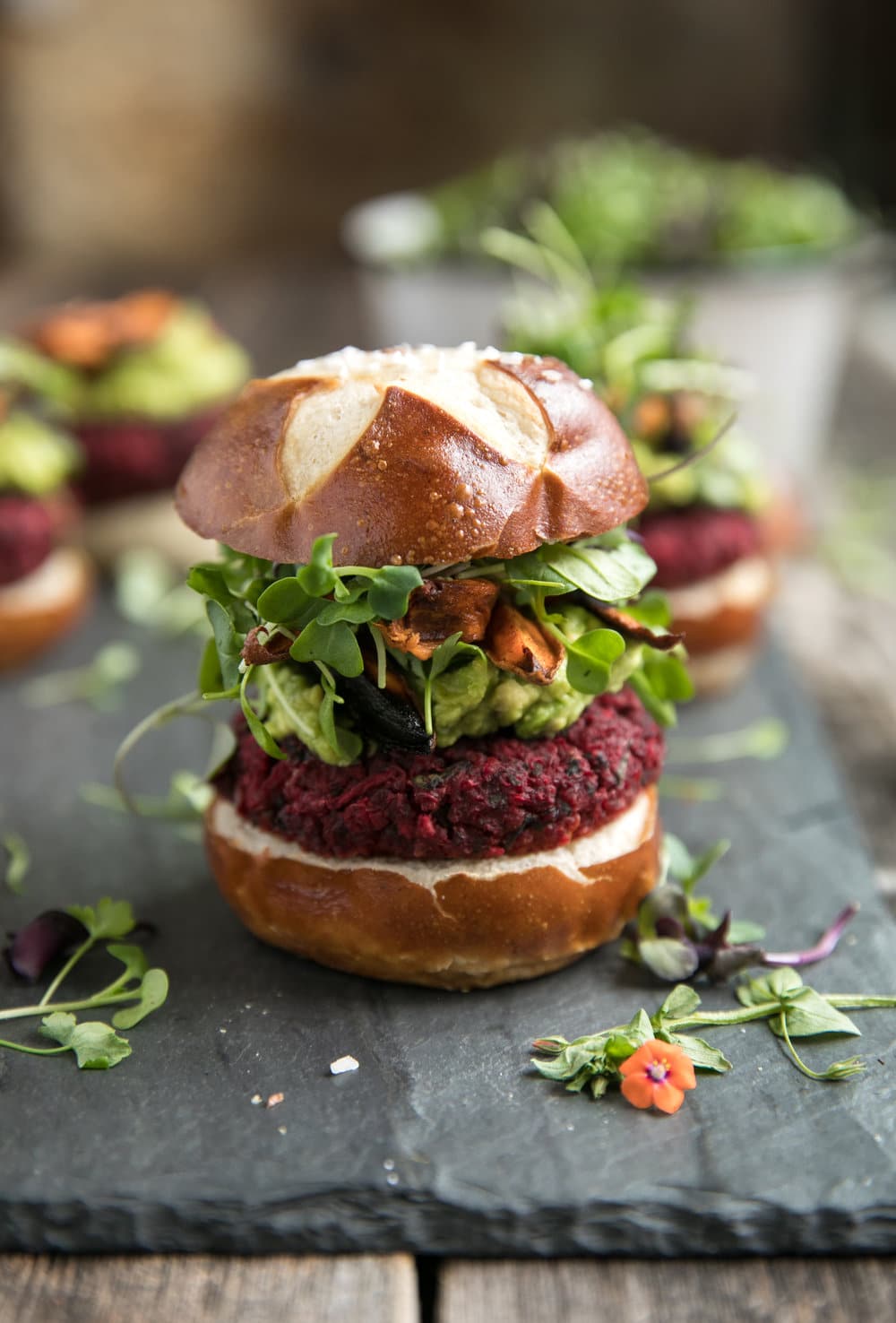 close up of complete Vegetarian Beet Burgers with Avocado and Sweet Potato Fries